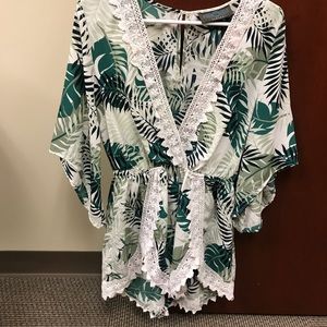 Tropical romper with lace trim